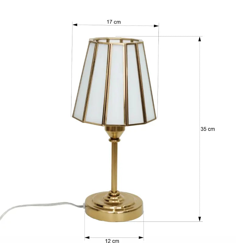 Table lamp with dimensions indicated on a white background