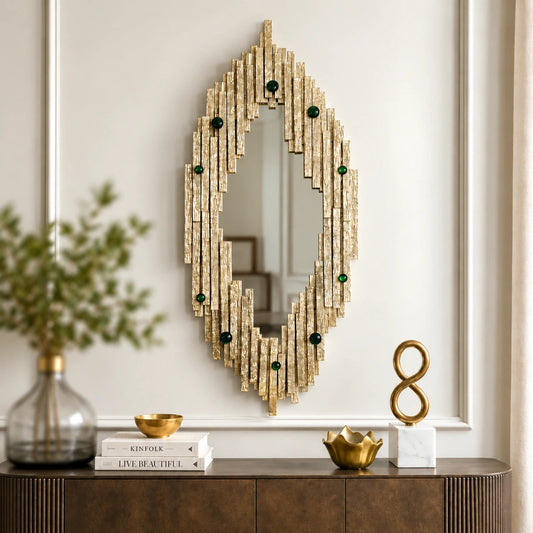 Casted Strips Wall Mirror – ILLUMEA luxury decorative wall mirror featuring a layered textured gold frame with emerald green accents and an elongated statement silhouette