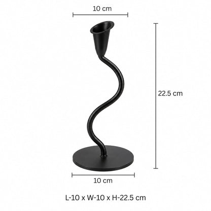 Decorative Black Metal Tealight Holder – ILLUMEA luxury single candle stand featuring an artistic curved stem and round base, designed to add an elegant contemporary accent to interiors