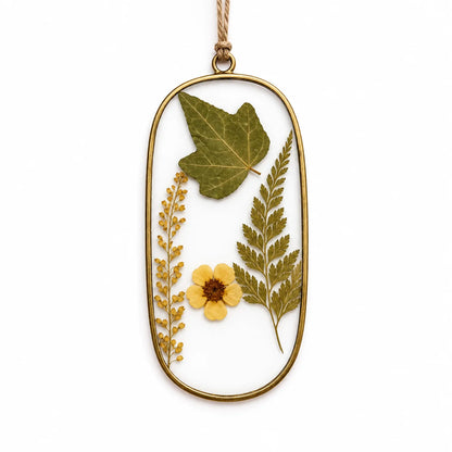 Decorative Pressed Flower Suncatcher Pendant with handcrafted metal framing and natural jute hanging cord – ILLUMEA
