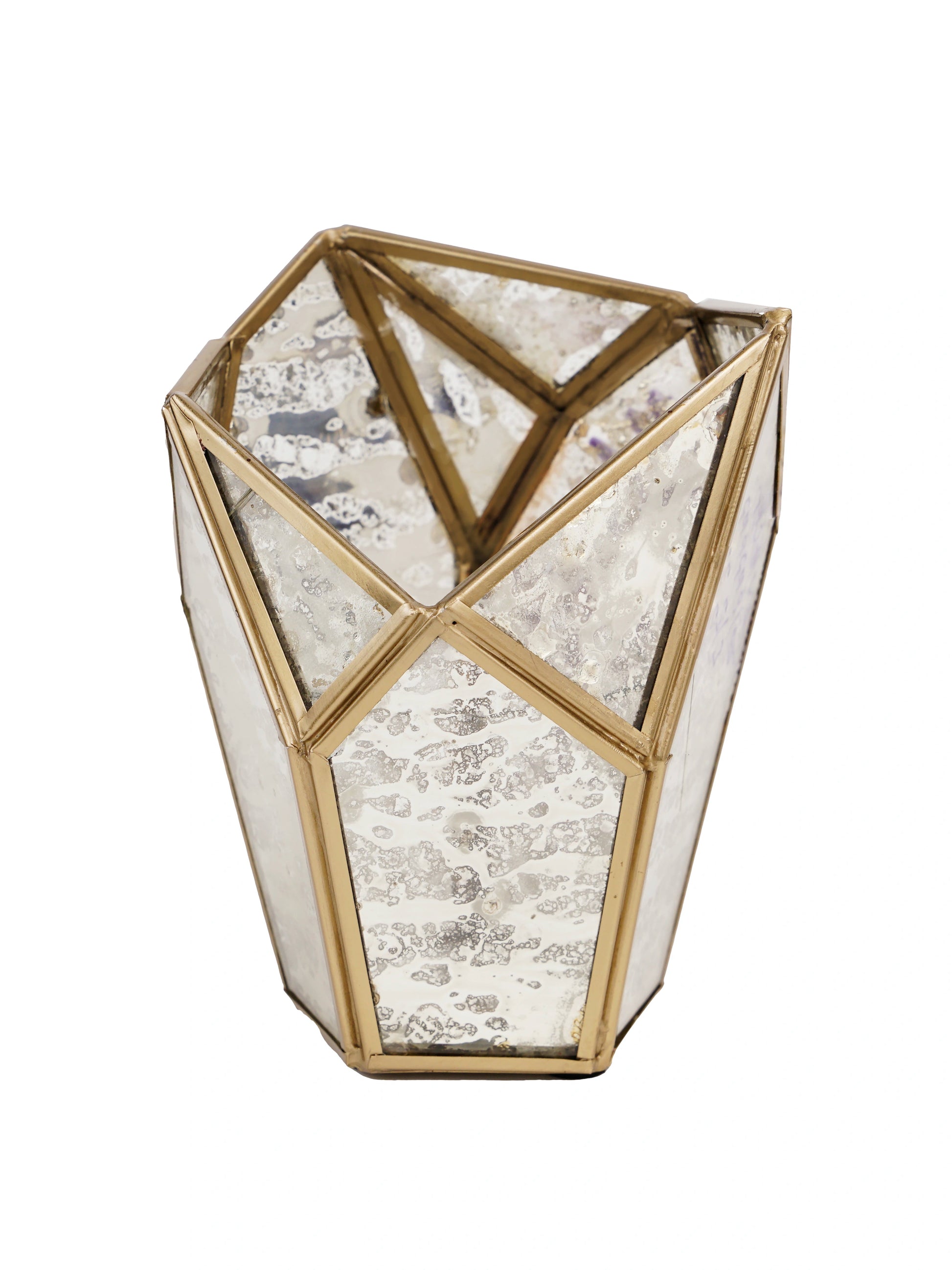 Elegant geometric tealight holder casting intricate shadows, perfect for modern home decor and ambient lighting.