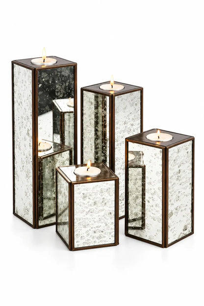 Silver Antique Glass Square Candle Holder Set of 4 – ILLUMEA elegant decorative candle stands in four varied heights with reflective mercury glass and dark metallic frames
