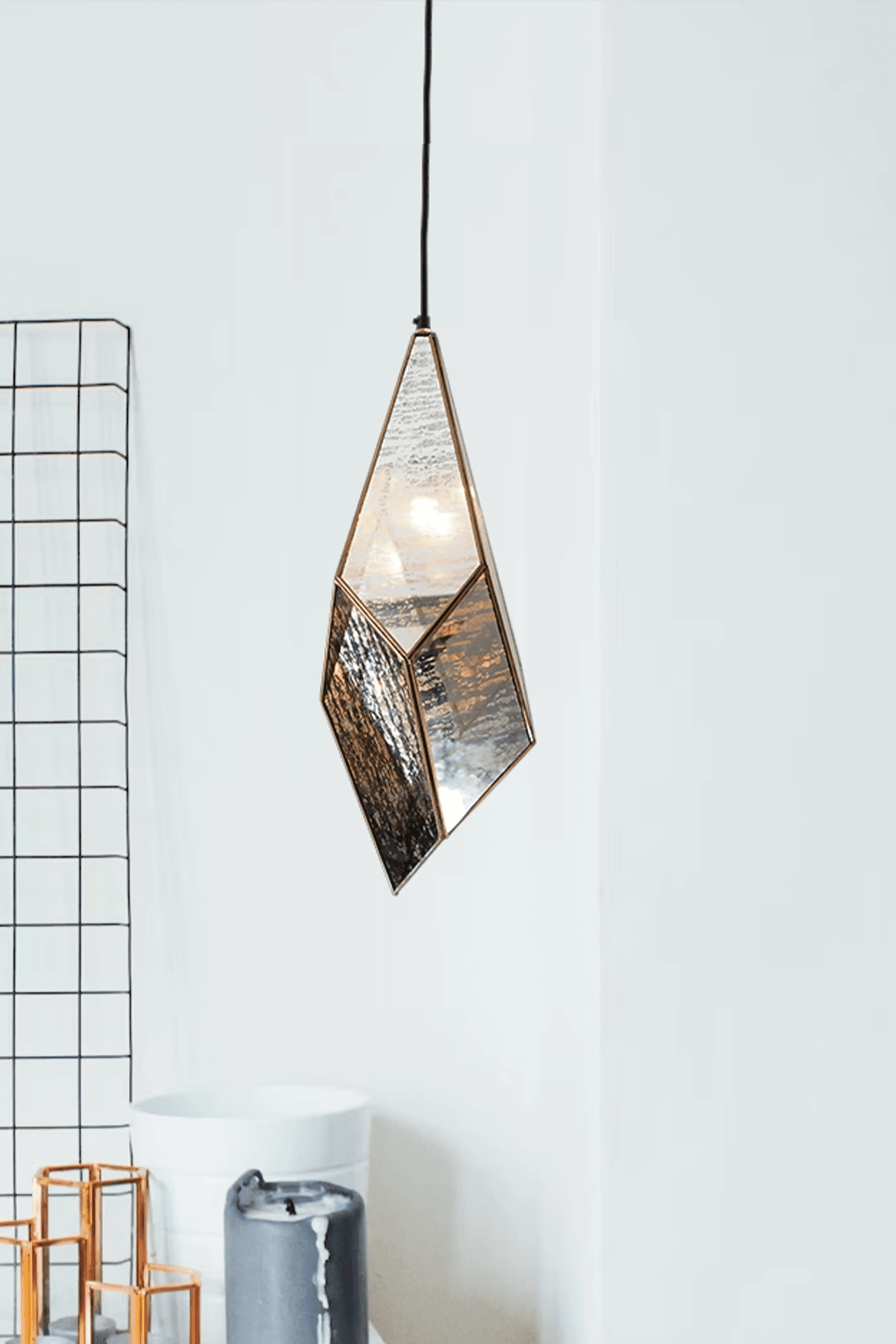 Elegant geometric crystal pendant showcasing intricate design and sparkling crystal elements for sophisticated style.