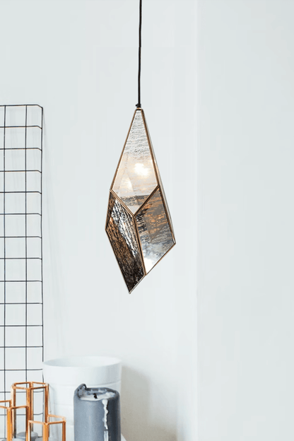 Elegant geometric crystal pendant showcasing intricate design and sparkling crystal elements for sophisticated style.