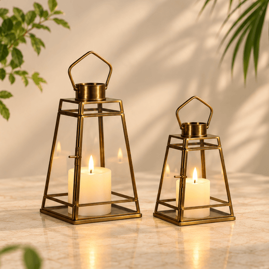 Antique Glass Hanging Lamp – ILLUMEA with brass framing, clear transparent glass and a curved hanging handle, creating a timeless decorative look for modern and classic interiors.